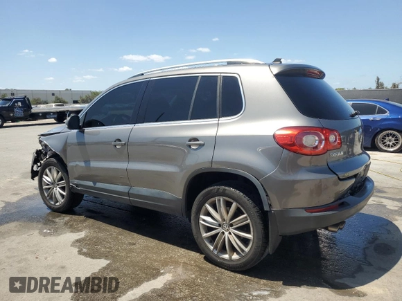 2011 Volkswagen Tiguan SE with VIN WVGBV7AX2BW561987, listed as a Copart auction lot 55385195 with 146,907 mi miles and Salvage Title. Bid and sale history available at DreamBid. Image 2.