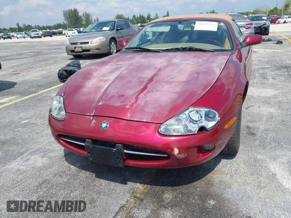 1997 Jaguar XK with VIN SAJGX2743VC017588, listed as a IAAI auction lot 42055716 with 66,052 mi miles and . Bid and sale history available at DreamBid. Image 6.