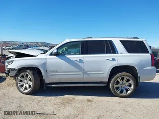 2016 Chevrolet Tahoe LTZ with VIN 1GNSKCKCXGR341155, listed as a IAAI auction lot 41244868 with 163,455 mi miles. Bid and sale history available at carsss.com. Image 13.