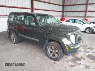 2008 Jeep Liberty Sport with VIN 1J8GN28K98W232003, listed as a IAAI auction lot 42127476 with 129,286 mi miles. Bid and sale history available at carsss.com. Image 1.