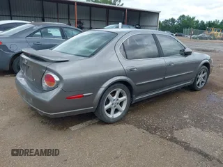 2002 Nissan Maxima GXE z VIN JN1DA31DX2T418118, wystawiony jako IAAI lot #42344516 z przebiegiem 285 061 mil mil oraz . Historia ofert i sprzedaży dostępna na DreamBid. Obrazek 4.