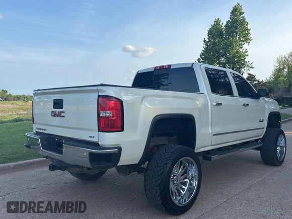 2015 GMC Sierra 1500 SLT with VIN 3GTU2VEC0FG239547, listed as a Copart auction lot 54957305 with 135,497 mi miles and Clean Title. Bid and sale history available at DreamBid. Image 4.
