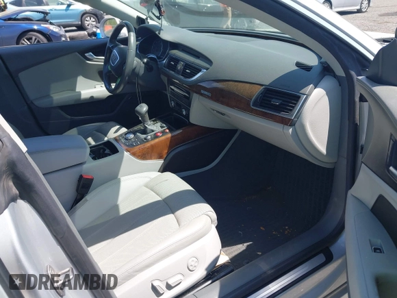 2014 Audi A7 Prestige with VIN WAU2GAFC3EN033481, listed as a IAAI auction lot 42094489 with 93,147 mi miles and . Bid and sale history available at DreamBid. Image 5.