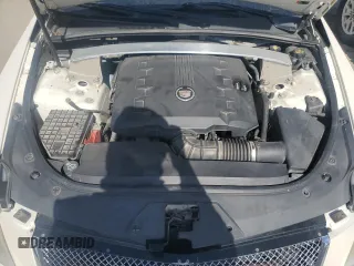 2013 Cadillac CTS z VIN 1G6DA1E3XD0104706, wystawiony jako Copart lot #78226674 z przebiegiem 96 022 mil mil oraz Szkoda całkowita • Salvage title. Historia ofert i sprzedaży dostępna na DreamBid. Obrazek 11.