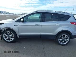 2015 Ford Escape Titanium with VIN 1FMCU9J97FUA05003, listed as a IAAI auction lot 41721214 with 51,644 mi miles. Bid and sale history available at carsss.com. Image 14.