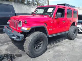 2019 Jeep Wrangler Unlimited Sahara with VIN 1C4HJXEN0KW552028, listed as a IAAI auction lot 41934634 with 53,054 mi miles and . Bid and sale history available at DreamBid. Image 18.