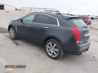 2012 Cadillac SRX Performance Collection with VIN 3GYFNEE32CS652976, listed as a IAAI auction lot 41427761 with 146,513 mi miles. Bid and sale history available at carsss.com. Image 3.