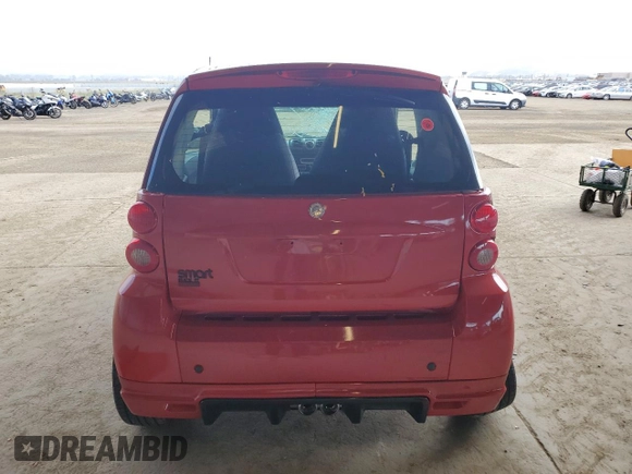2009 Smart fortwo Pure with VIN WMEEJ31X79K249060, listed as a Copart auction lot 56927145 with Not provided miles and Salvage title. Bid and sale history available at DreamBid. Image 6.