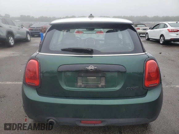 2017 MINI Hardtop Cooper with VIN WMWXP5C55H2D16587, listed as a Copart auction lot 60855195 with 77,769 mi miles and Salvage title. Bid and sale history available at DreamBid. Image 6.