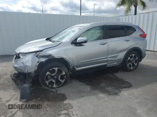 2017 Honda CR-V Touring with VIN 2HKRW2H9XHH610071, listed as a Copart auction lot 46273065 with 187,164 mi miles and Clean Title. Bid and sale history available at carsss.com. Image 1.