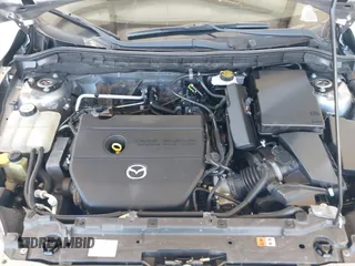 2011 Mazda Mazda3 i Sport with VIN JM1BL1UF4B1433743, listed as a IAAI auction lot 42021606 with 116,288 mi miles. Bid and sale history available at carsss.com. Image 10.