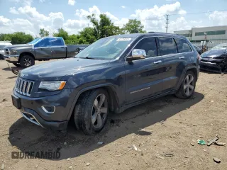 2015 Jeep Grand Cherokee Overland with VIN 1C4RJFCT1FC638648, listed as a Copart auction lot 61739035 with 110,519 mi miles and Salvage title. Bid and sale history available at DreamBid. Image 1.