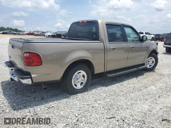2001 Ford F-150 XLT z VIN 1FTRW07L81KF68346, wystawiony jako Copart lot #57460445 z przebiegiem Nie podano mil oraz Szkoda całkowita • Salvage title. Historia ofert i sprzedaży dostępna na DreamBid. Obrazek 3.