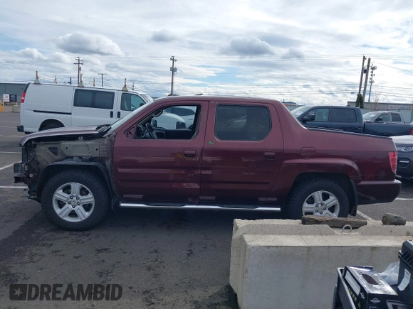 2009 Honda Ridgeline RTL with VIN 5FPYK16539B101836, listed as a IAAI auction lot 41894409 with 185,325 mi miles. Bid and sale history available at carsss.com. Image 15.