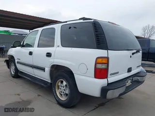 2001 Chevrolet Tahoe LT with VIN 1GNEC13T51R158637, listed as a IAAI auction lot 41718610 with 101,984 mi miles. Bid and sale history available at carsss.com. Image 3.