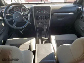 2010 Jeep Wrangler Unlimited Sport with VIN 1J4BA3H1XAL164225, listed as a Copart auction lot 49873055 with 75,665 mi miles and Salvage Title. Bid and sale history available at carsss.com. Image 8.
