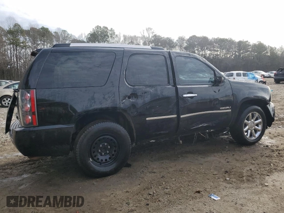 2012 GMC Yukon Denali with VIN 1GKS1EEF1CR304040, listed as a Copart auction lot 42874135 with 182,879 mi miles and Salvage Title. Bid and sale history available at carsss.com. Image 3.
