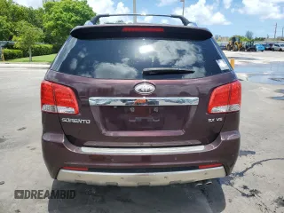 2012 Kia Sorento SX with VIN 5XYKW4A29CG308152, listed as a Copart auction lot 64895355 with 126,816 mi miles and Salvage title. Bid and sale history available at DreamBid. Image 6.
