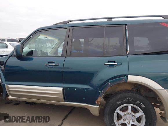 2002 Mitsubishi Montero Limited z VIN JA4MW51RX2J040586, wystawiony jako IAAI lot #41566077 z przebiegiem 149 851 mil mil oraz . Historia ofert i sprzedaży dostępna na DreamBid. Obrazek 14.