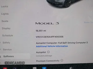2023 Tesla Model 3 with VIN 5YJ3E1EA4PF400306, listed as a IAAI auction lot 42398603 with 18,551 mi miles and . Bid and sale history available at DreamBid. Image 7.