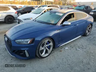 2021 Audi RS 5 Sportback z VIN WUAAWCF51MA901341, wystawiony jako Copart lot #76619034 z przebiegiem Nie podano mil oraz Szkoda całkowita • Salvage title. Historia ofert i sprzedaży dostępna na DreamBid. Obrazek 1.