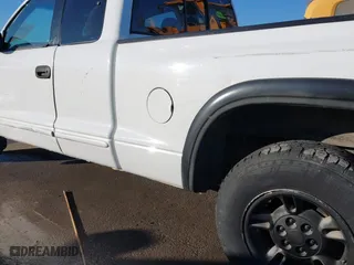 1998 Dodge Dakota SLT with VIN 1B7GL22Y6WS686210, listed as a IAAI auction lot 41184877 with 152,555 mi miles. Bid and sale history available at carsss.com. Image 13.