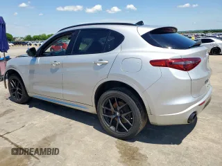 2020 Alfa Romeo Stelvio Sport z VIN ZASPAJAN5L7C75684, wystawiony jako Copart lot #54244135 z przebiegiem 63 941 mil mil oraz Szkoda całkowita • Salvage title. Historia ofert i sprzedaży dostępna na DreamBid. Obrazek 2.