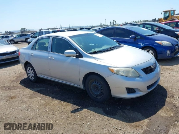2010 Toyota Corolla with VIN 1NXBU4EE1AZ319230, listed as a IAAI auction lot 41988978 with 238,497 mi miles. Bid and sale history available at carsss.com. Image 1.