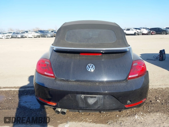 2014 Volkswagen Beetle 1.8T with VIN 3VW517AT4EM815243, listed as a IAAI auction lot 41245346 with 119,259 mi miles and . Bid and sale history available at DreamBid. Image 16.