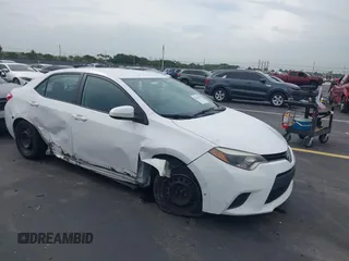 2014 Toyota Corolla L z VIN 2T1BURHE1EC053787, wystawiony jako IAAI lot #42646778 z przebiegiem 110 089 mil mil oraz . Historia ofert i sprzedaży dostępna na DreamBid. Obrazek 1.