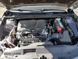 2019 Toyota Camry LE z VIN 4T1B11HKXKU209352, wystawiony jako Copart lot #52219645 z przebiegiem 23 136 mil mil oraz Szkoda całkowita • Salvage title. Historia ofert i sprzedaży dostępna na DreamBid. Obrazek 11.
