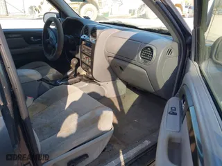 2005 GMC Envoy SLE with VIN 1GKDT13S852116252, listed as a IAAI auction lot 42086929 with 1 mi miles. Bid and sale history available at carsss.com. Image 5.