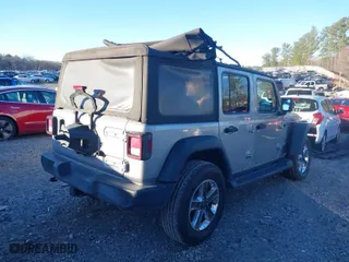 2018 Jeep Wrangler Unlimited Sport S with VIN 1C4HJXDG0JW158935, listed as a IAAI auction lot 41187384 with 69,721 mi miles. Bid and sale history available at carsss.com. Image 4.