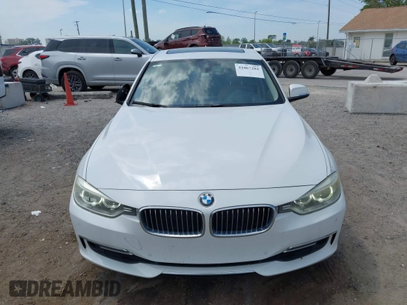 2012 BMW 3 Series 328i with VIN WBA3A5C51CF348290, listed as a IAAI auction lot 41867281 with 100,757 mi miles. Bid and sale history available at carsss.com. Image 12.