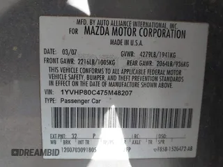 2007 Mazda Mazda6 i Sport VE with VIN 1YVHP80C475M48207, listed as a IAAI auction lot 41028164 with 173,307 mi miles. Bid and sale history available at carsss.com. Image 9.