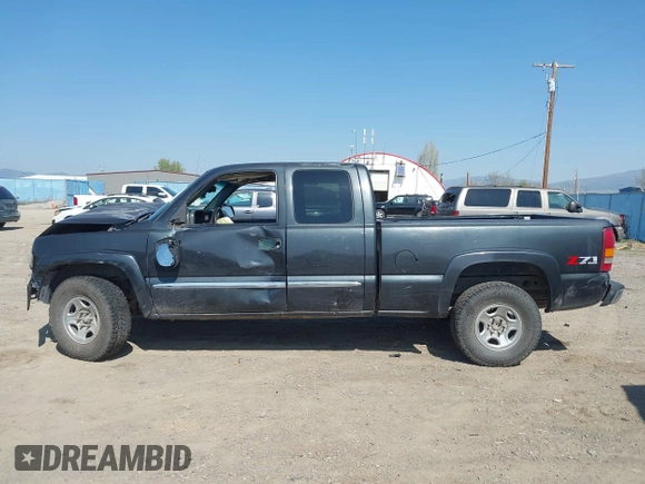 2003 GMC Sierra 1500 SLT z VIN 1GTEK19T03E191705, wystawiony jako IAAI lot #42145392 z przebiegiem Nie podano mil oraz . Historia ofert i sprzedaży dostępna na DreamBid. Obrazek 15.