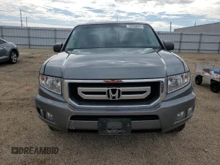 2009 Honda Ridgeline RTL z VIN 5FPYK16569B103645, wystawiony jako Copart lot #58300625 z przebiegiem 103 195 mil mil oraz Szkoda całkowita • Salvage title. Historia ofert i sprzedaży dostępna na DreamBid. Obrazek 5.