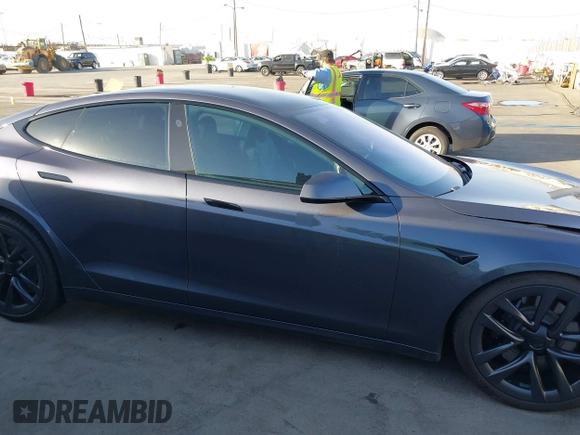 2021 Tesla Model S Long Range with VIN 5YJSA1E53MF436865, listed as a IAAI auction lot 41384837 with 20,829 mi miles and . Bid and sale history available at DreamBid. Image 12.