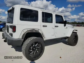 2015 Jeep Wrangler Unlimited Sahara with VIN 1C4BJWEG6FL614671, listed as a Copart auction lot 86052284 with 92,894 mi miles and Salvage title. Bid and sale history available at DreamBid. Image 3.