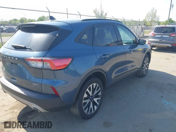 2020 Ford Escape SE Sport Hybrid with VIN 1FMCU9BZ6LUC38008, listed as a IAAI auction lot 42143784 with 81,804 mi miles and . Bid and sale history available at DreamBid. Image 4.