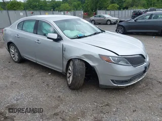 2013 Lincoln MKS with VIN 1LNHL9DK4DG606551, listed as a IAAI auction lot 42343140 with 70,424 mi miles and . Bid and sale history available at DreamBid. Image 1.