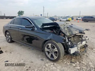 2019 Mercedes-Benz E 300 with VIN WDDZF4JB2KA618999, listed as a Copart auction lot 56915465 with 64,077 mi miles and Salvage title. Bid and sale history available at DreamBid. Image 4.
