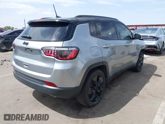 2021 Jeep Compass Altitude with VIN 3C4NJCBB3MT560123, listed as a IAAI auction lot 41914646 with 61,155 mi miles. Bid and sale history available at carsss.com. Image 4.