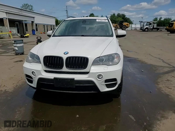 2012 BMW X5 35i with VIN 5UXZV4C54CL763857, listed as a Copart auction lot 57943195 with 143,522 mi miles and Salvage title. Bid and sale history available at DreamBid. Image 14.