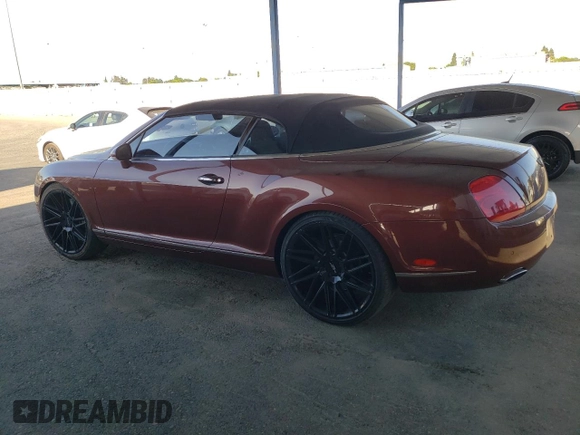 2007 Bentley Continental GT with VIN SCBDR33W77C047935, listed as a Copart auction lot 60557985 with 61,661 mi miles and Salvage title. Bid and sale history available at DreamBid. Image 2.