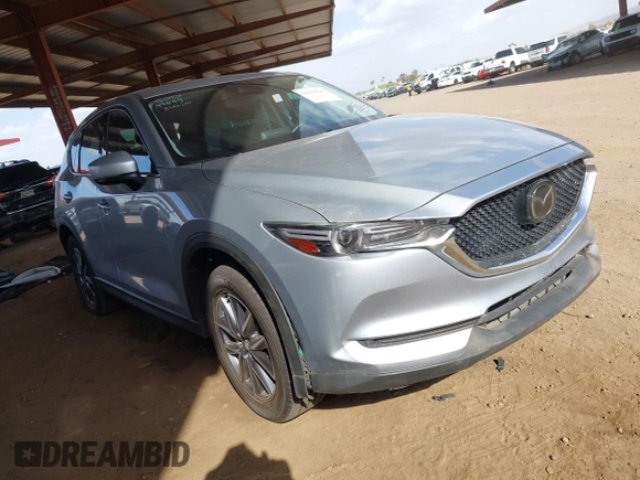 2017 Mazda CX-5 Grand Touring with VIN JM3KFADL3H0121772, listed as a IAAI auction lot 41935183 with 48,869 mi miles and . Bid and sale history available at carsss.com. Image 1.