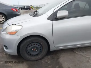 2009 Toyota Yaris with VIN JTDBT903394043218, listed as a IAAI auction lot 41974570 with 281,000 mi miles. Bid and sale history available at carsss.com. Image 16.