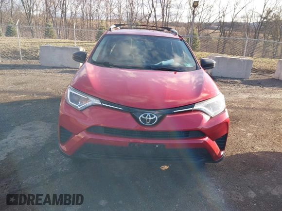 2016 Toyota RAV4 LE with VIN JTMBFREVXGJ100692, listed as a IAAI auction lot 41847333 with 130,822 mi miles. Bid and sale history available at carsss.com. Image 12.