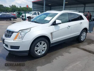 2011 Cadillac SRX Luxury Collection z VIN 3GYFNAEY2BS527043, wystawiony jako IAAI lot #42234641 z przebiegiem 114 769 mil mil oraz . Historia ofert i sprzedaży dostępna na DreamBid. Obrazek 2.