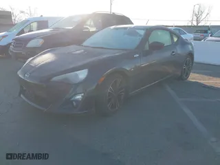 2014 Scion FR-S with VIN JF1ZNAA11E8706432, listed as a IAAI auction lot 41450785 with 153650 miles. Bid and sale history available at carsss.com. Image 17.